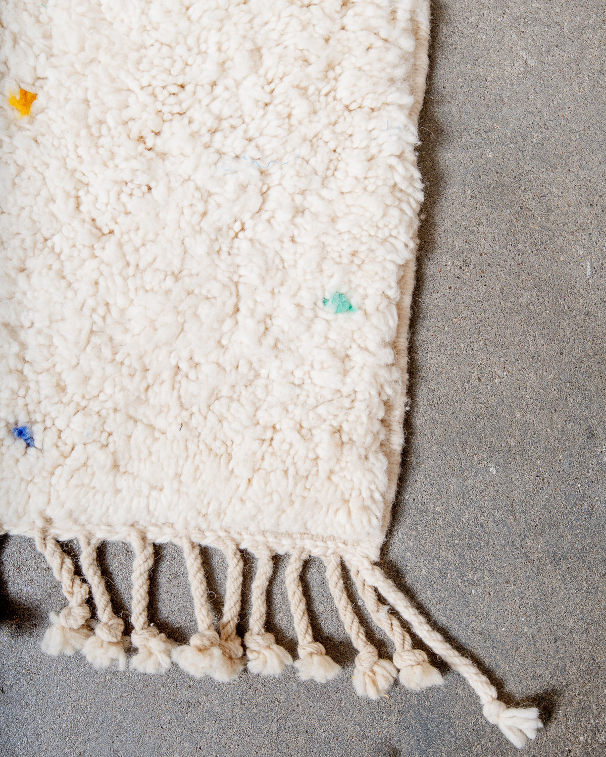 Modern, designer, handcrafted Berber rug from Morocco. Beniourain carpet with beautiful colours and patterns and fluffy wool texture.